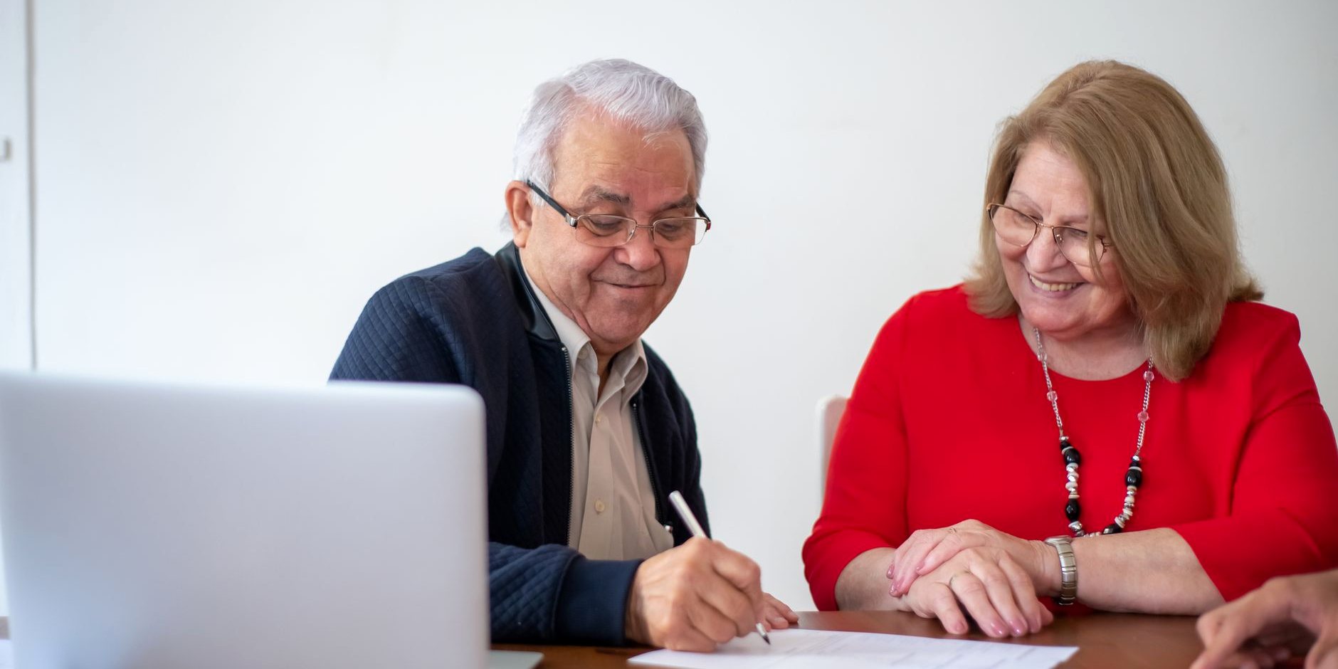 A couple going through paperwork together