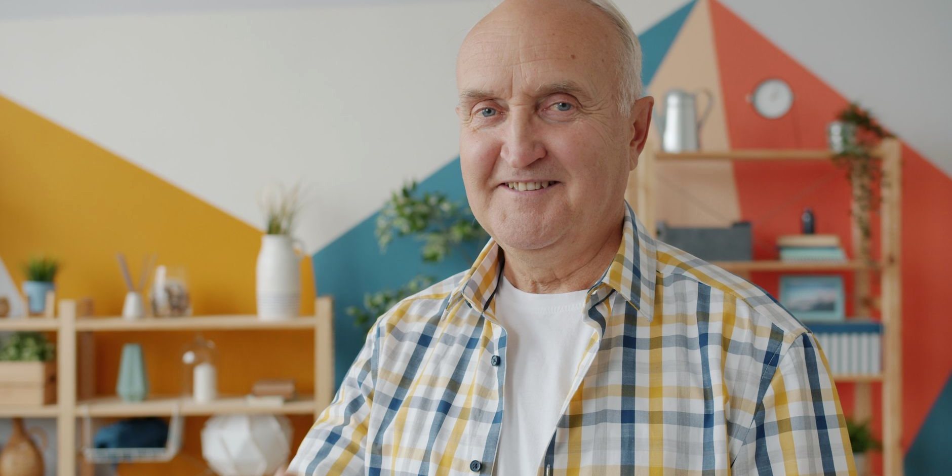 An older man smiling