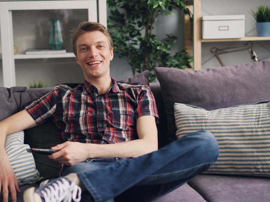 A man relaxed at home after a procedure